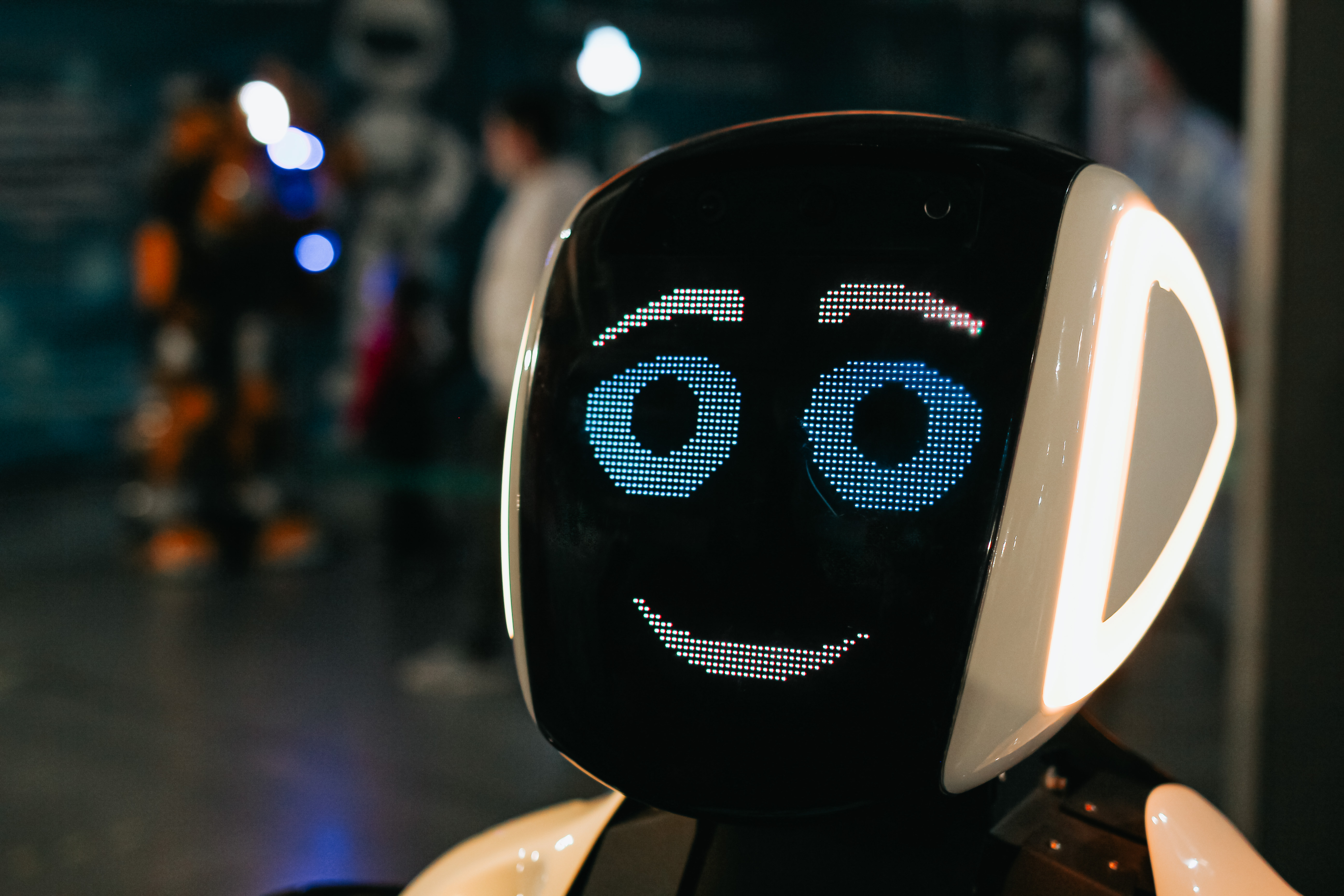 Smiling AI robot representing intelligent chatbot technology
